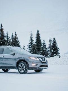 Grey Nissan Rogue parked amidst snowy winter scene, How To Remote Start A Nissan Rogue