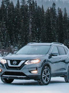 Grey Nissan Rogue parked amidst snowy winter scene, How Big Is A Nissan Rogue? [Dimensions Explored]