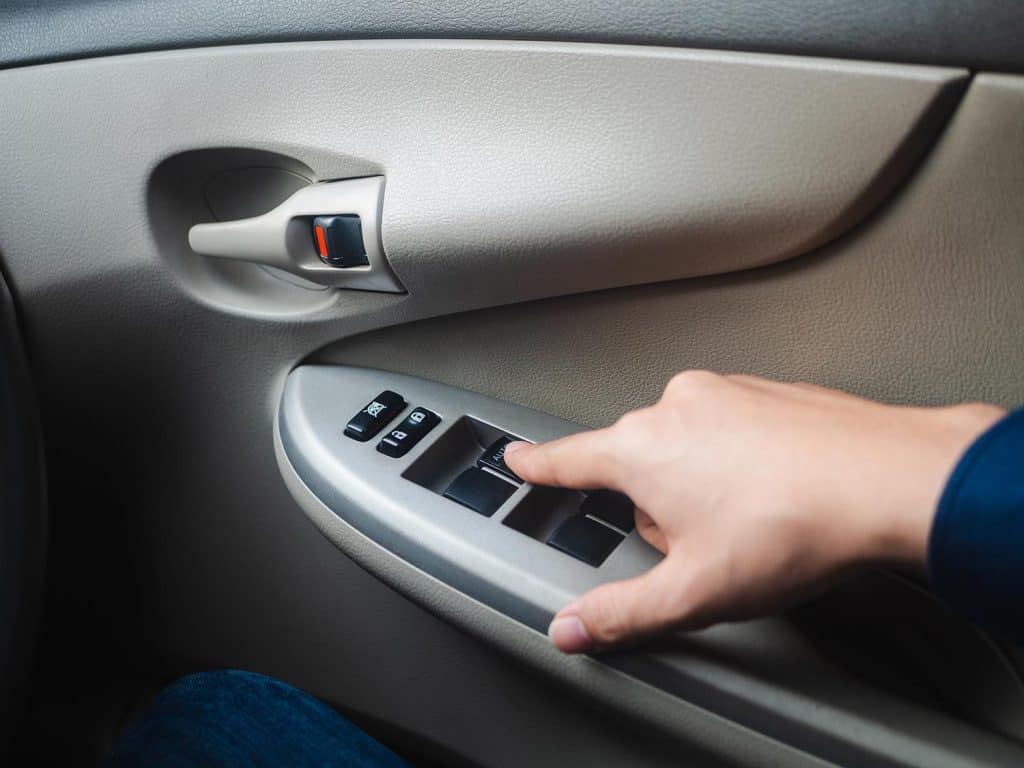 Hand push button mirror in car