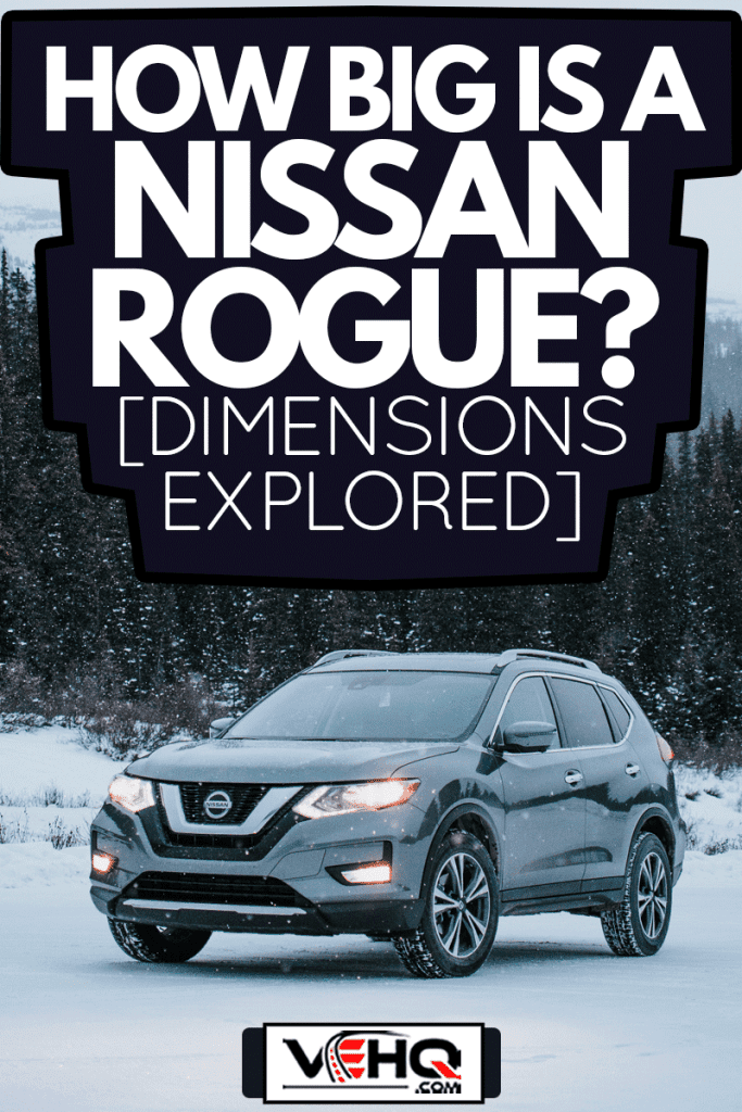 Grey Nissan Rogue parked amidst snowy winter scene, How Big Is A Nissan Rogue? [Dimensions Explored]