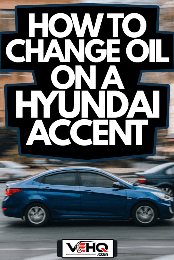 Blue Hyundai Accent car moving on the street, How To Change Oil On A Hyundai Accent