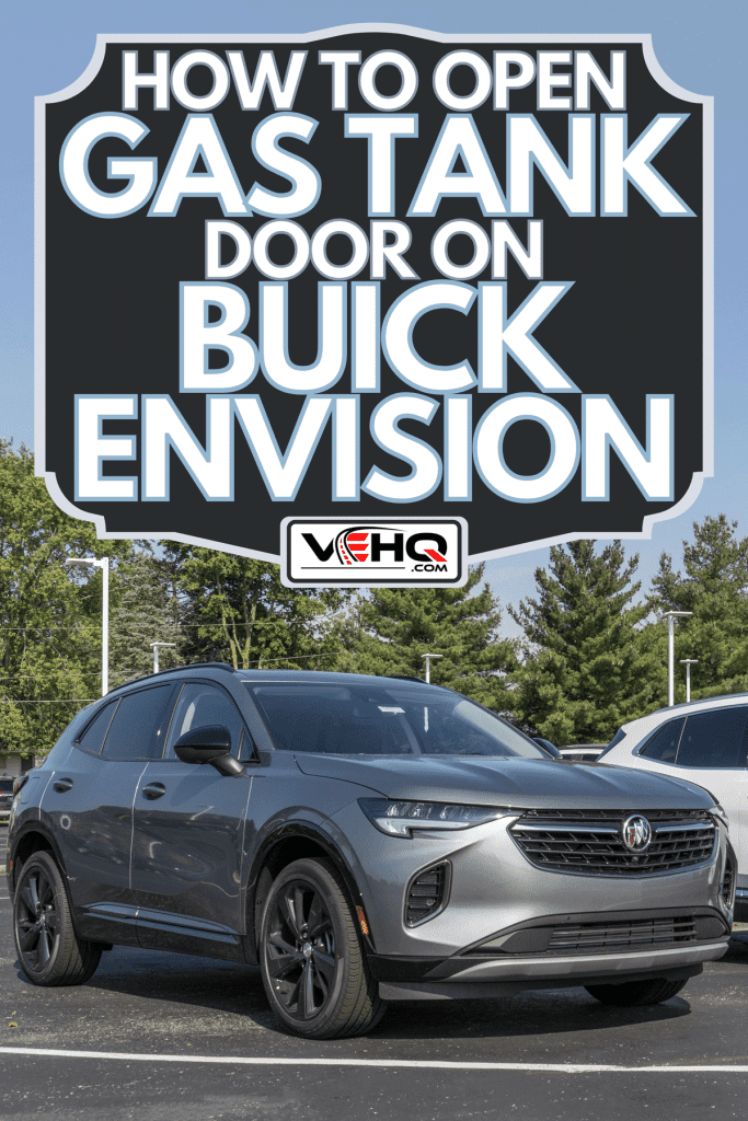 Buick Envision SUV on a parking lot, How To Open Gas Tank Door On Buick Envision