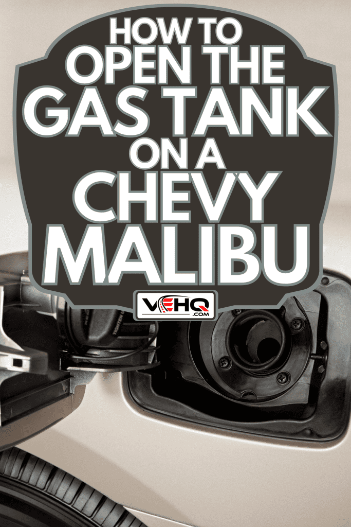 Open gas tank of a white car, How To Open The Gas Tank On A Chevy Malibu