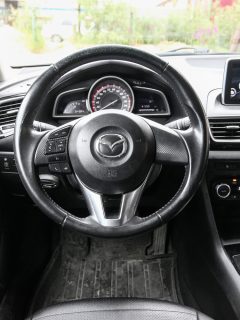 Interior if the compact hatchback Mazda 3, How To Reset The Check Engine Light On Mazda 3?