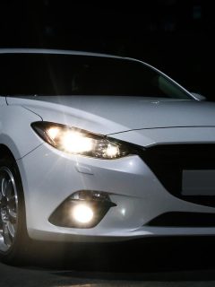 A Mazda 3 in the city street at night, How Long Is A Mazda 3 [Plus Other Specs And Dimensions]
