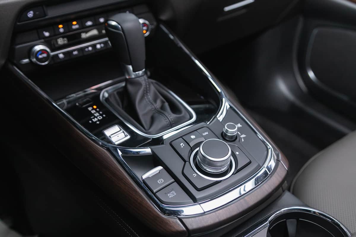Mazda CX-9, Close-up view of the automatic gearbox lever. Interior car, automatic transmission gearshift stick