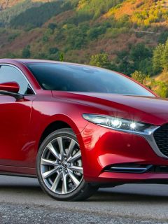 A Mazda3 Sedan stopped on a mountain road, Does Mazda 3 Have A Remote Start? [And How To Use It]