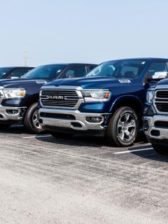 A Ram 1500 pickup trucks at a dealership, Ram 1500 Laramie Vs. Big Horn—Which Is Right For You?