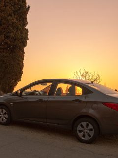 The car Hyundai accent is parked in nature, How To Open Hyundai Accent Without A Key