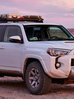 A Toyota 4Runner SUV at dusk in rock desert landscape, How To Unlock Toyota 4Runner With A Dead Battery?