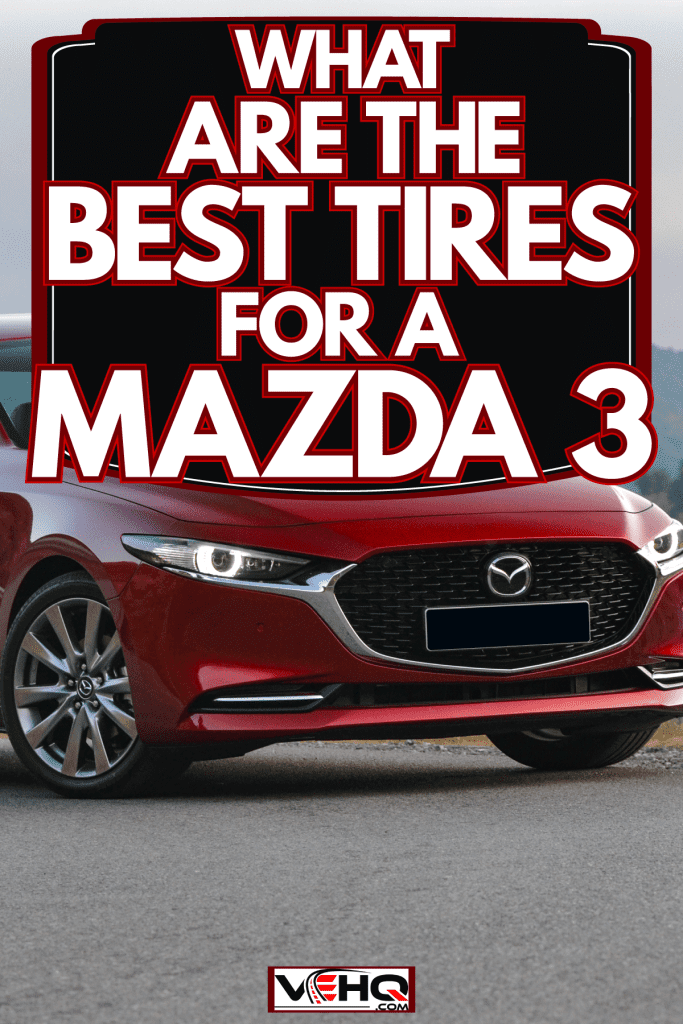 A red colored Mazda 3 parked on the side of the highway, What Are The Best Tires For Mazda 3