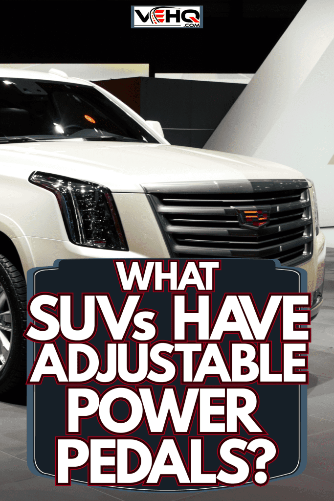 A huge white Cadillac Escalade at a car show, What SUVs Have Adjustable Power Pedals?