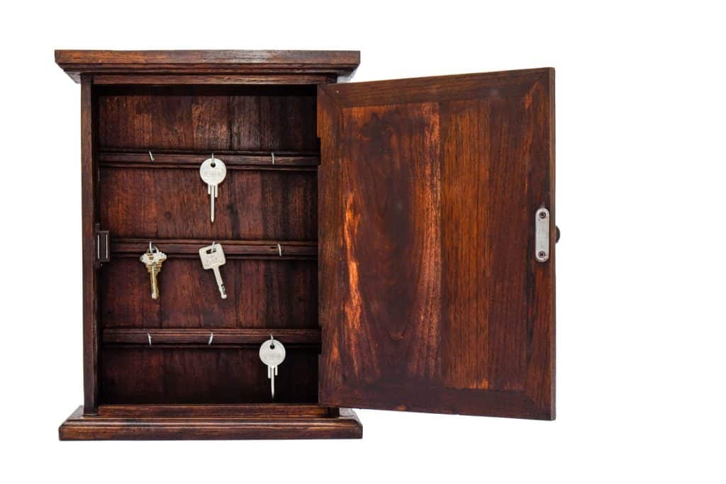 opened wood key cabinet on isolated background