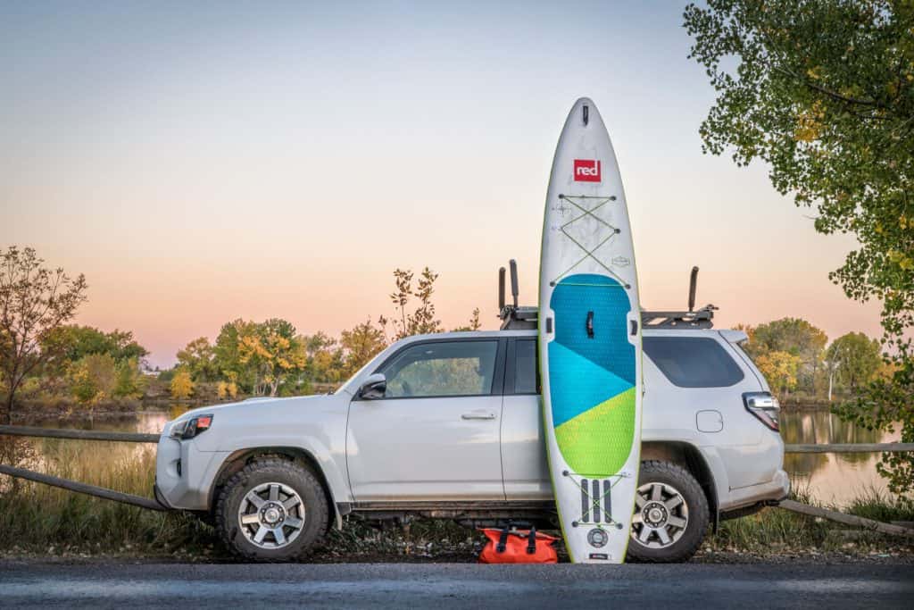 oyota 4Runner SUV (2016 trail model) with an inflatable touring stand up paddleboard