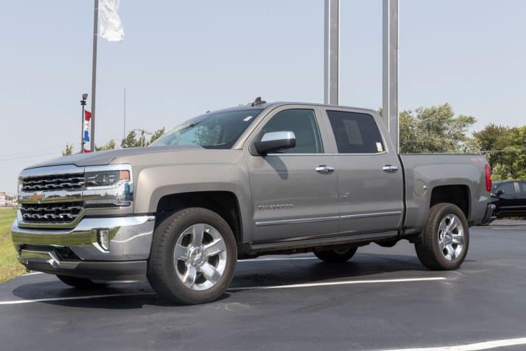 A Chevrolet Silverado 1500 at a dealership, How Tall Is A Chevy Silverado? [Will It Fit In My Garage?]