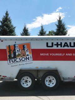 A U-haul trailer is prepared to be loaded up for a move, How Long Is A U-Haul Car Trailer?