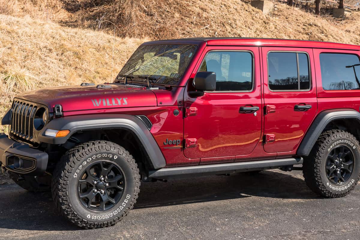 A red colored Jeep Wrangler 