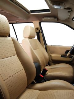 A beige colored leather car seats, How Many Seats Does A Hyundai Santa Fe Have