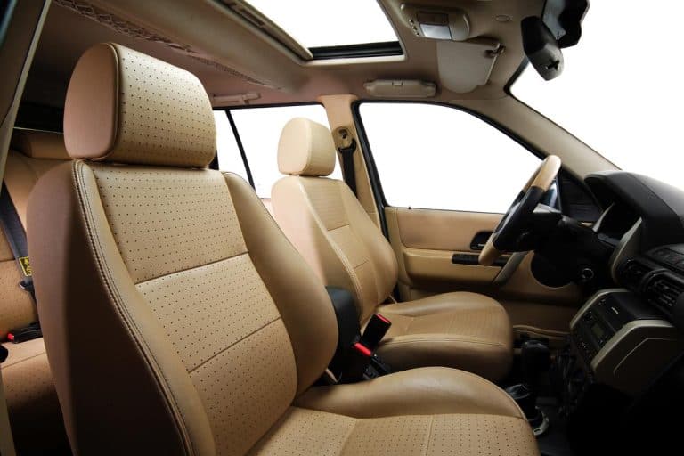 A beige colored leather car seats, How Many Seats Does A Hyundai Santa Fe Have