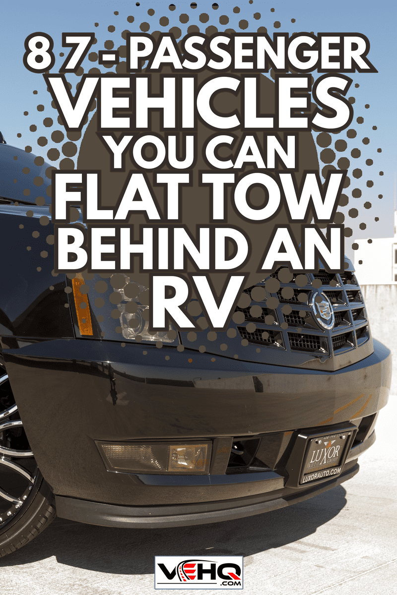 Black Lincoln Navigator parked by the side of the road - 8 7-Passenger Vehicles You Can Flat Tow Behind An RV