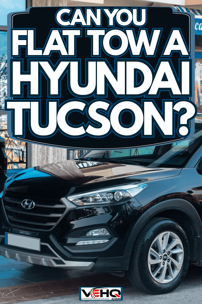 A black Hyundai Tucson patked on the side of the street, Can You Flat Tow A Hyundai Tucson?