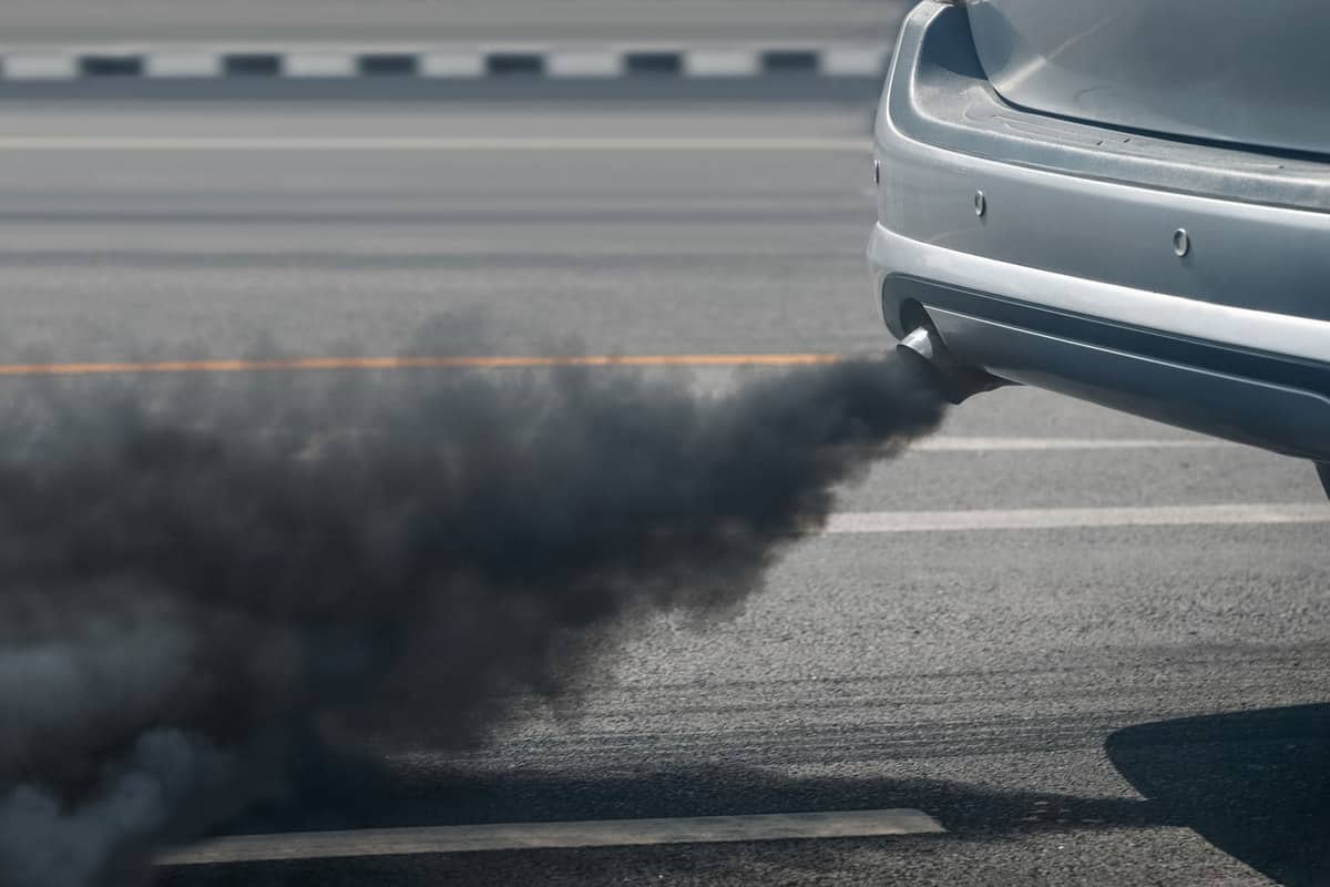 Car exhaust a dirty black smoke which leads to air pollution