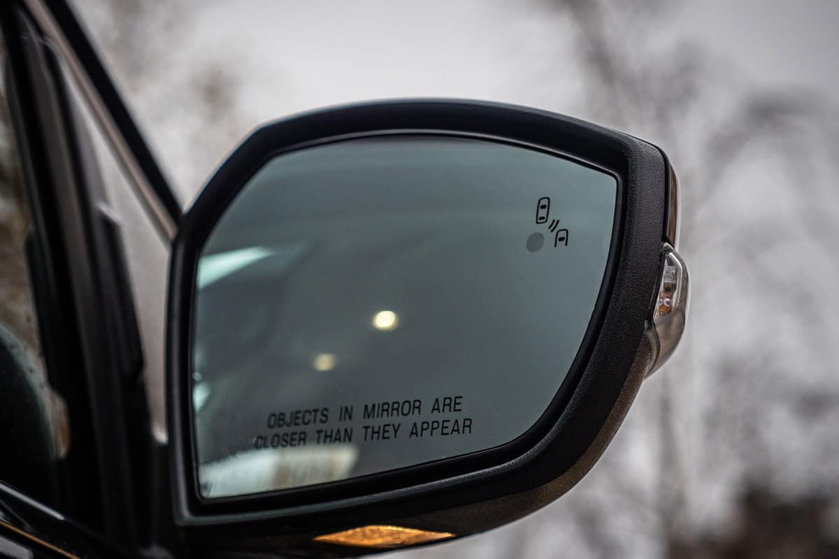Car side mirror with blind spot monitoring