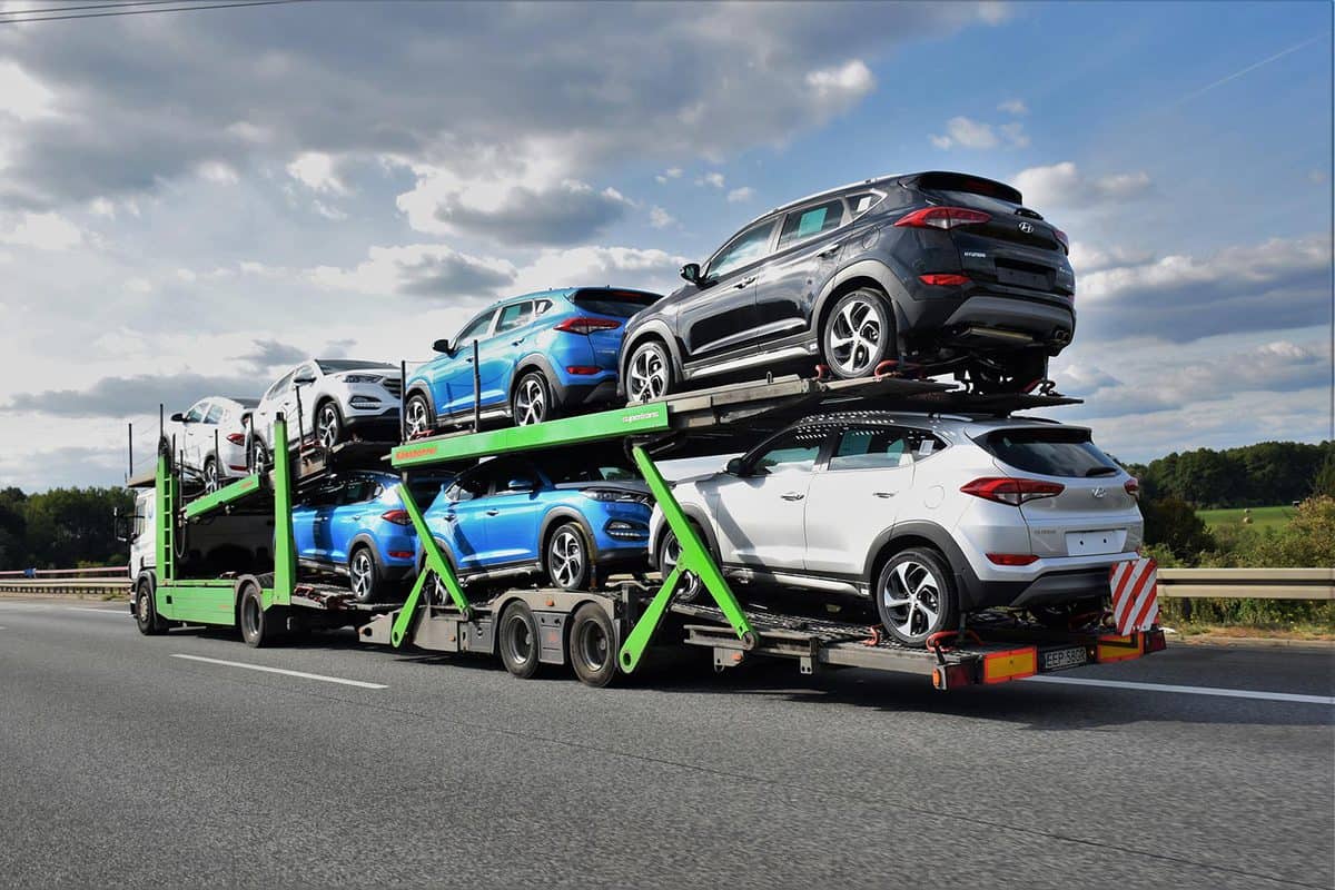 Car transporter driving on the highway