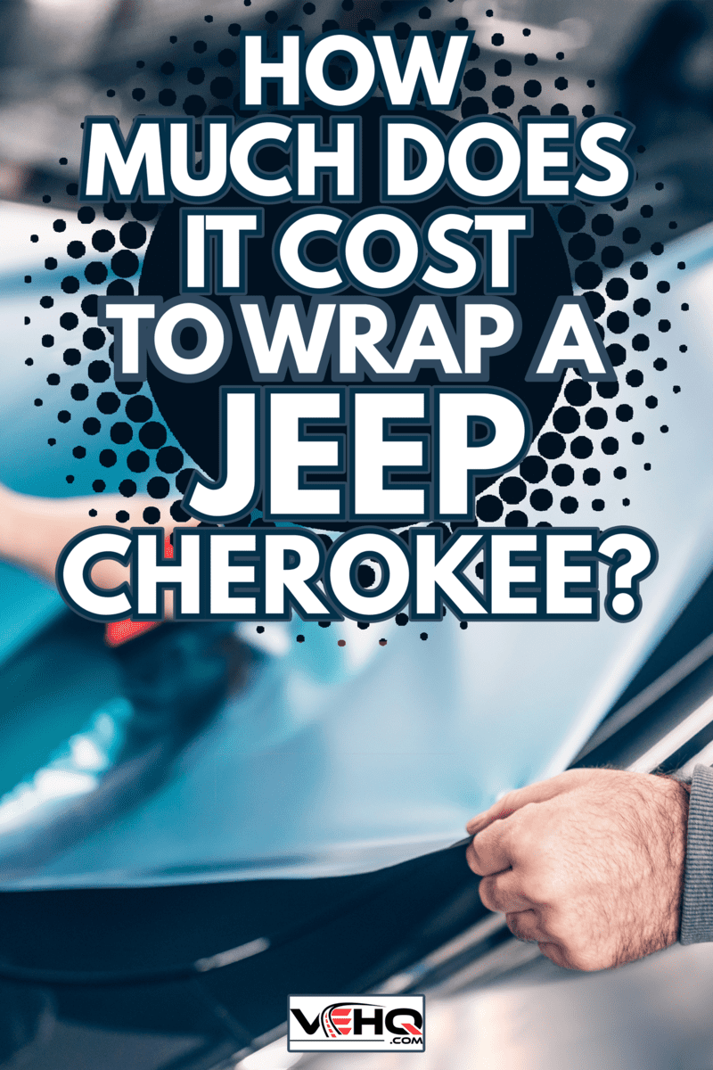 Car wrapping specialist putting vinyl foil or film on car - How Much Does It Cost To Wrap A Jeep Cherokee
