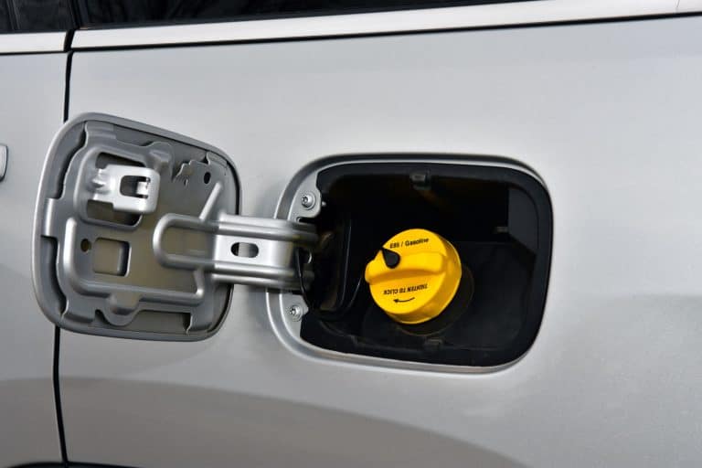 Exterior of car with fuel filler door open. , How To Open The Gas Tank On A Hyundai Tucson [In 4 Easy Steps!]