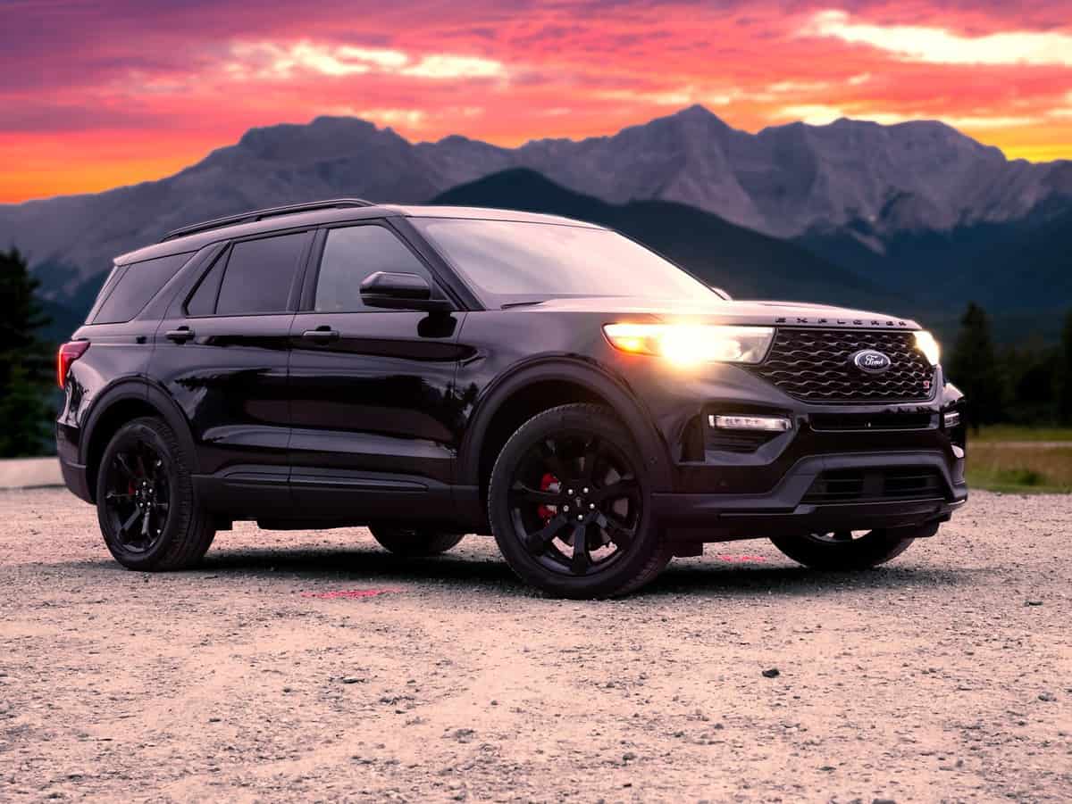 Ford's New 2020 Explorer Poses In Front Of Mountains During A Sunset