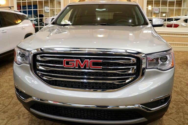 A front view of a brand new GMC Acadia SLE in white color, Can You Flat Tow A GMC Acadia [And How To]