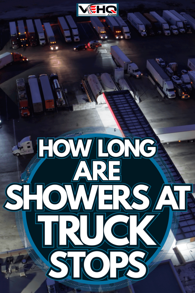 Dozens of trucks parked at a truck stop while being refueled, How Long Are Showers At Truck Stops?