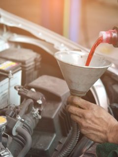Mechanic pouring transmission fluid, How Long Can You Drive With Low Transmission Fluid?