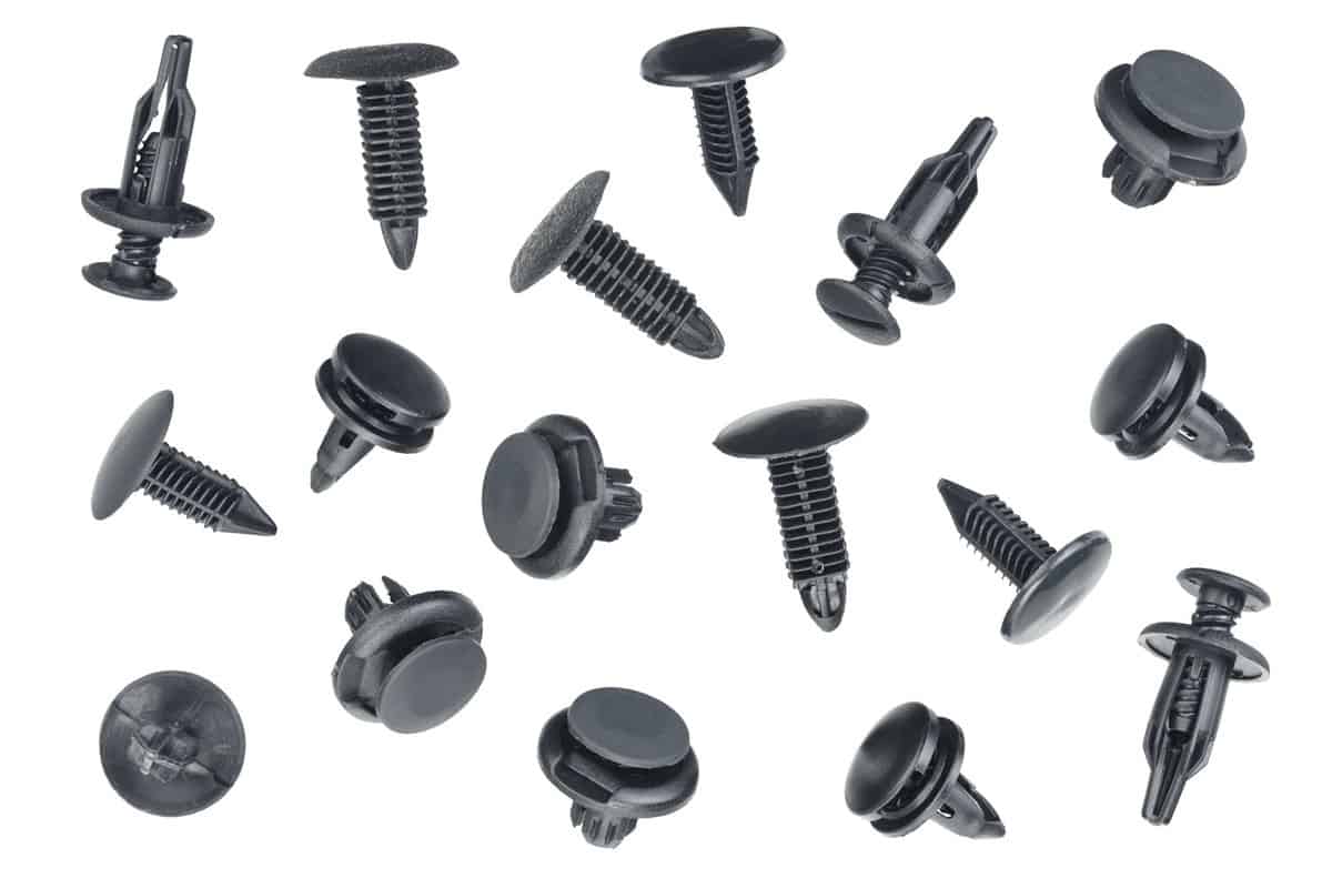 Plastic fasteners and rivets on a white background