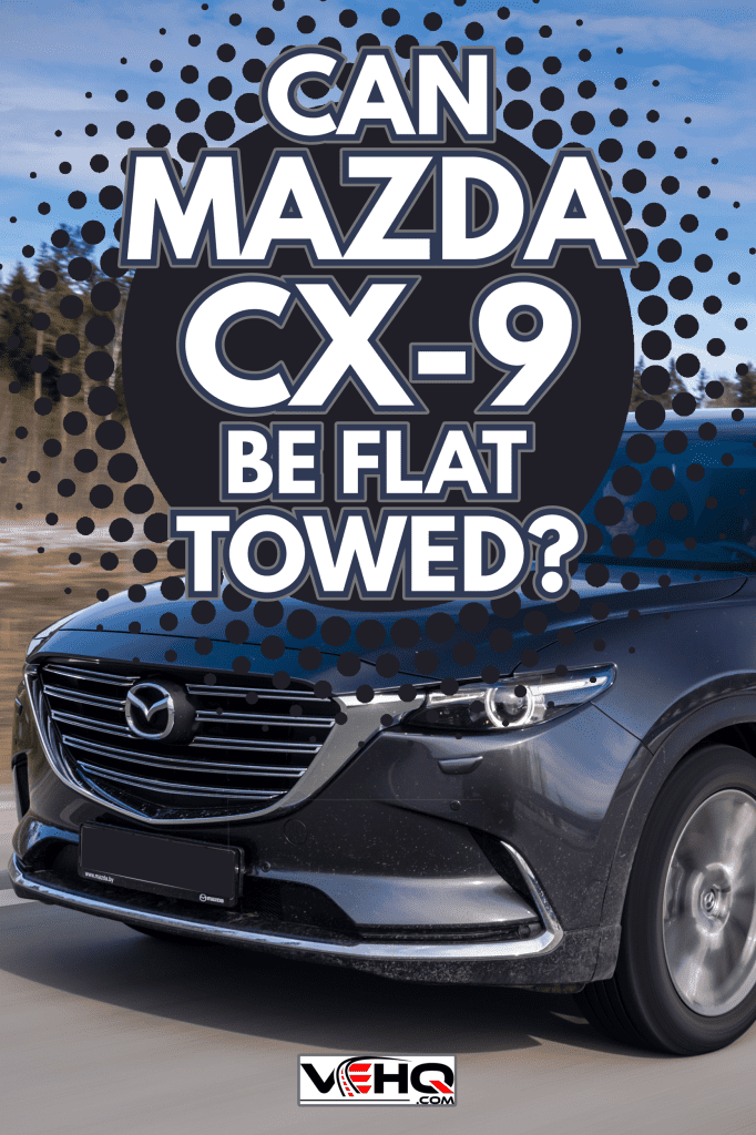 Second generation of Mazda CX-9 drives on a highway during the test-drive event. Mazda CX-9 is a truly striking 7-passenger SUV. - Can Mazda CX-9 Be Flat Towed