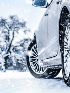 Tire in winter on snow road. Winter tires with car detail - What Does Snow Mode Do In A Jeep Cherokee
