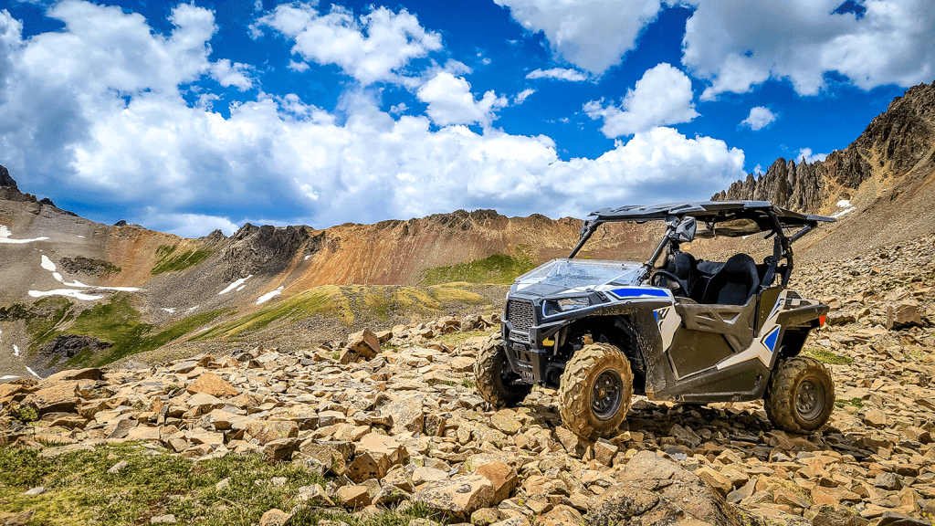 UTV ATV with a beautiful mountain range in the background