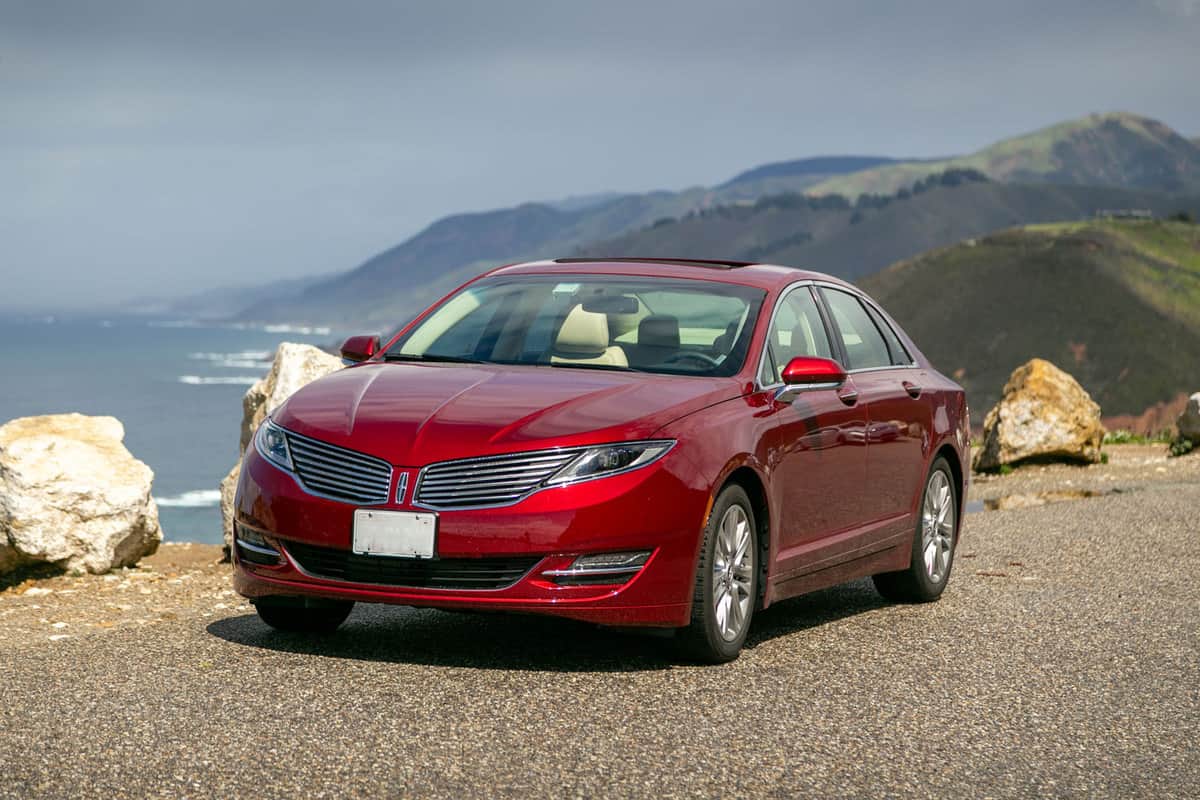 A 2014 Lincoln MKZ parked at a viewdeck for a gorgeous view of the ocean