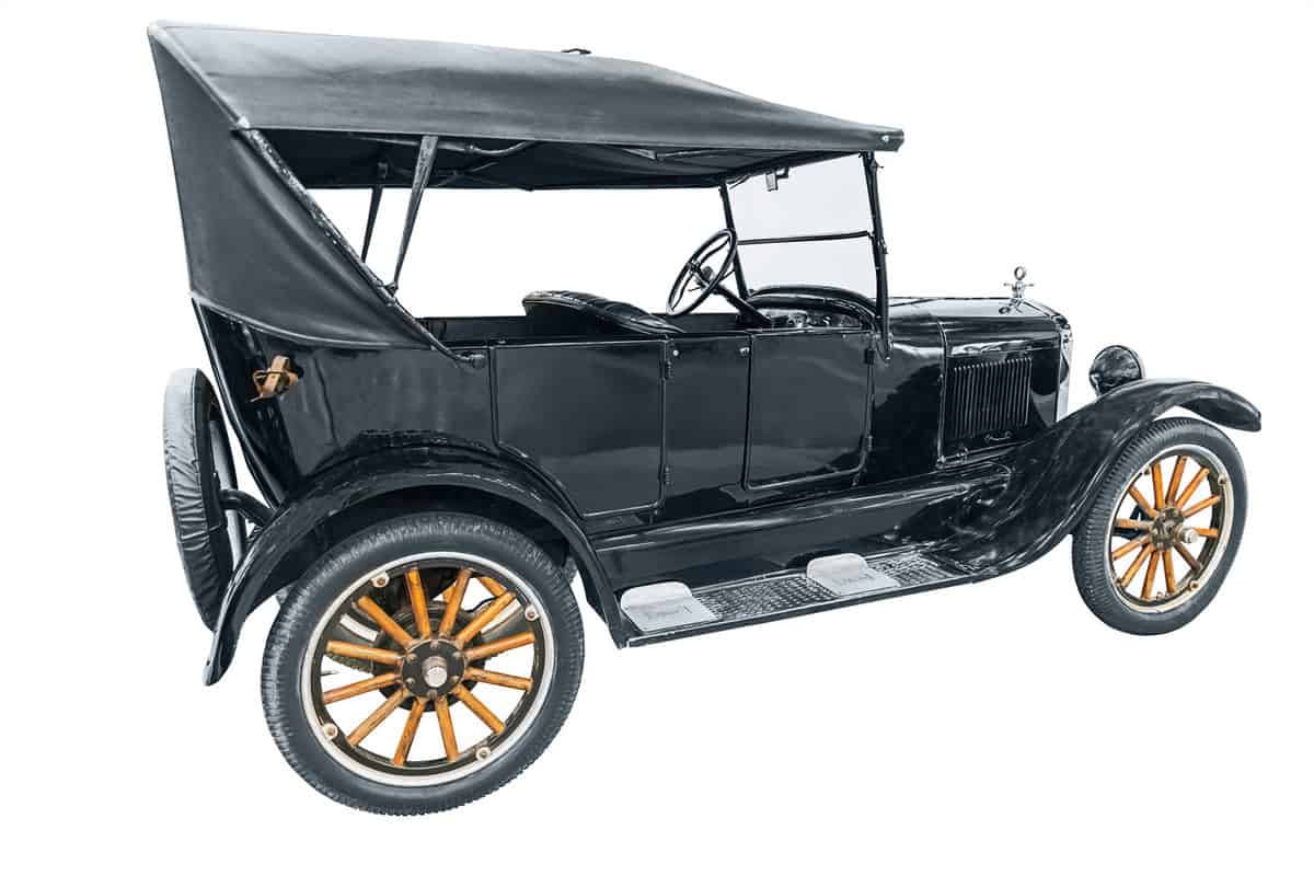 A Ford Model T on a white background