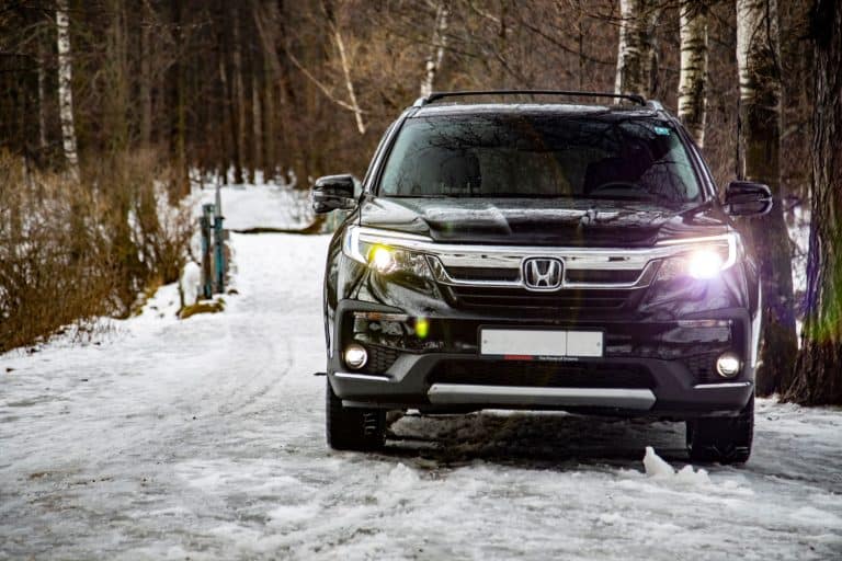 A Honda Pilot parked on the side of a snowy road, How Long Is A Honda Pilot?