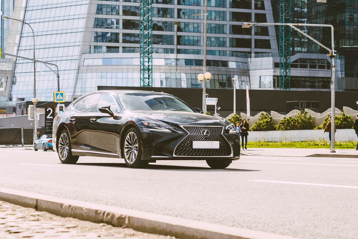 A Lexus LS500h moving down the city road