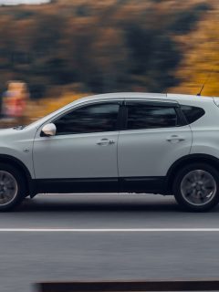 A Nissan Rogue moving fast on the highway, Does Nissan Rogue Have Apple CarPlay?