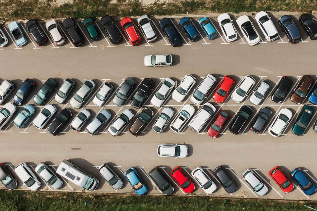 A busy and tightly filled parking area