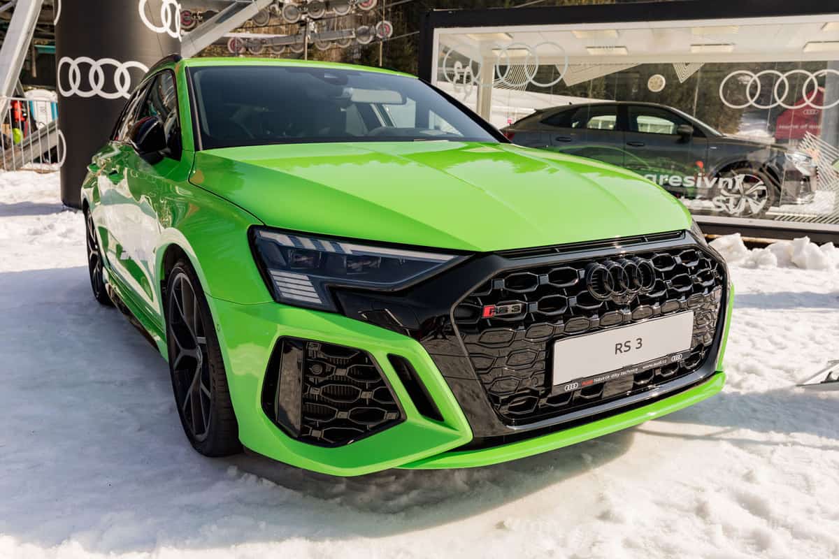 A green Audi RS 3 at carshow