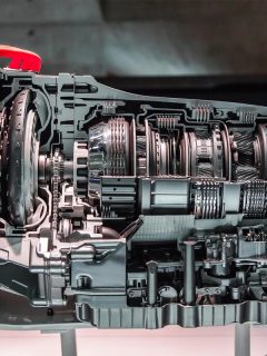 An automobile transmission gearbox in sections, Can Transmission Fluid Get Low Without A Leak? [6 Points To Check]