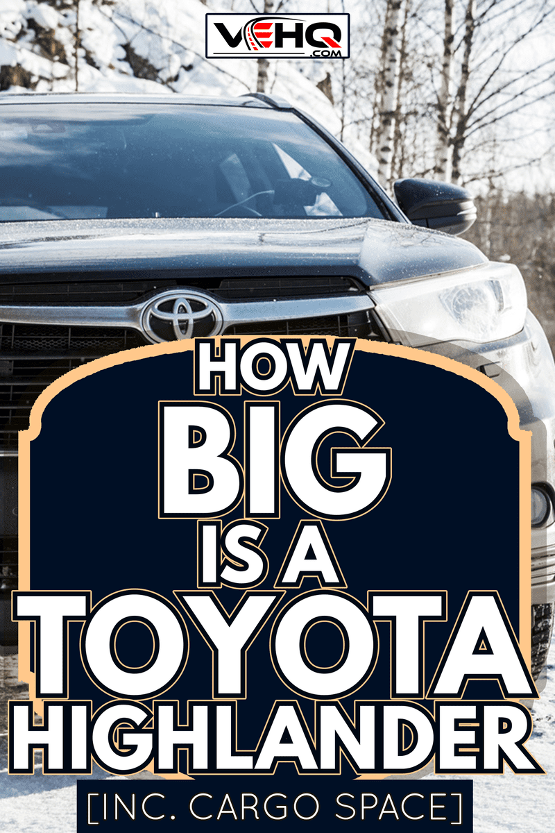 Black Toyota Highlander car stands on a roadside in winter season, front view - How Big Is A Toyota Highlander? [Inc. Cargo Space]