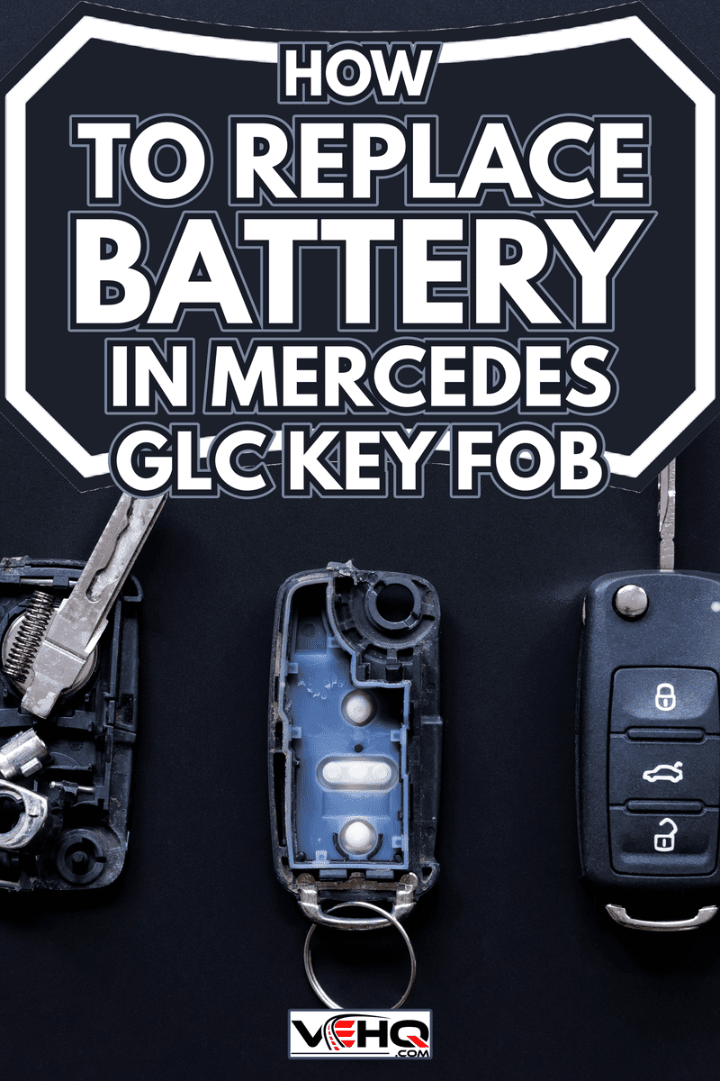 Broken or damaged remote key fob and new vehicle key on black dark grey background - How To Replace Battery In Mercedes GLC Key Fob