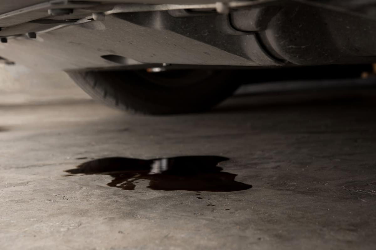 Car leaking oil due to a broken axle