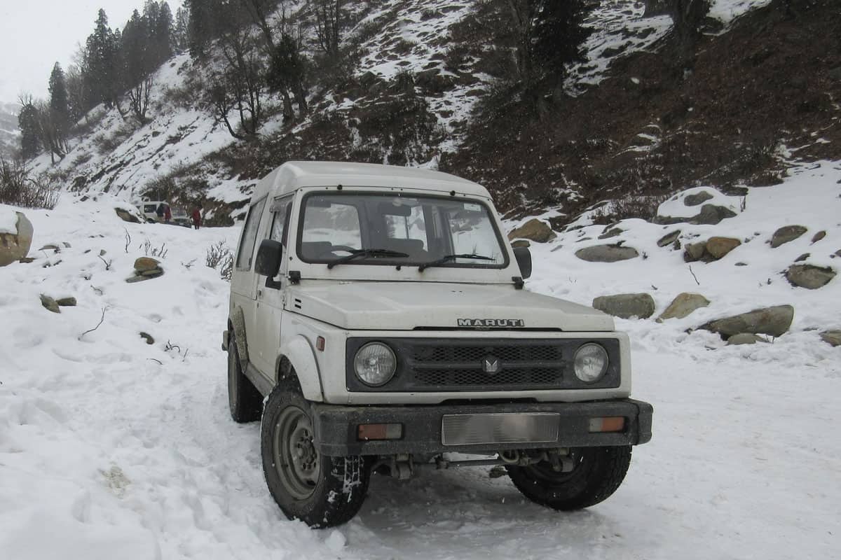 Cars with 4 Wheel Drive 4X4 in a heavy snow-covered mountain area